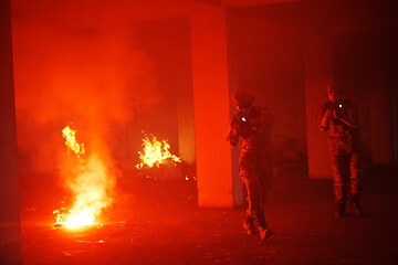 Image showing military troops in action urban environment