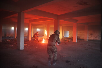 Image showing military troops in action urban environment