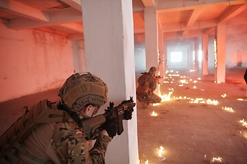 Image showing military troops in action urban environment