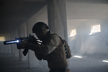 Image showing modern warfare soldier in urban environment battlefield