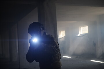 Image showing modern warfare soldier in urban environment battlefield