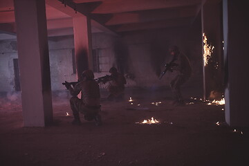 Image showing military troops in action urban environment