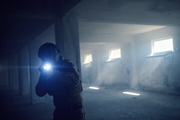 Image showing modern warfare soldier in urban environment battlefield