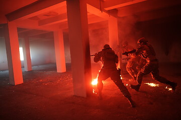 Image showing military troops in action urban environment