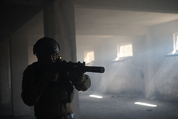 Image showing modern warfare soldier in urban environment battlefield