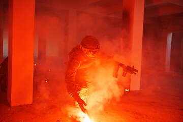 Image showing military troops in action urban environment