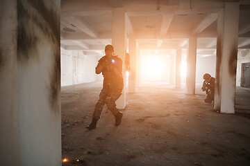 Image showing military troops in action urban environment