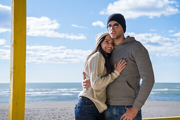 Image showing Couple chating and having fun at beach bar