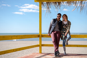 Image showing Couple chating and having fun at beach bar