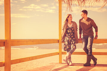 Image showing Couple chating and having fun at beach bar