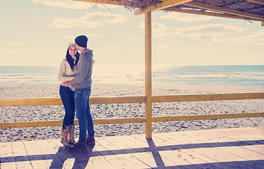 Image showing Couple chating and having fun at beach bar