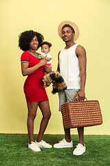 Image showing Happy family having picnic at studio