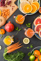 Image showing mason jar glasses of vegetable juices on table