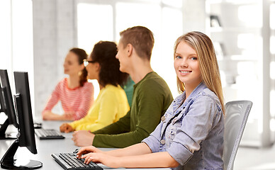 Image showing happy high school students in computer class