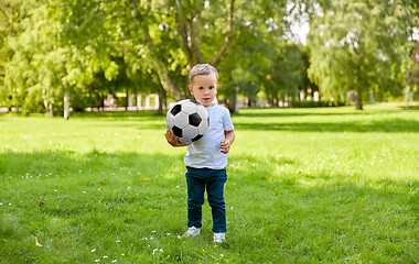 Image showing little baby boy with soccer ball at summer park
