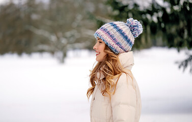 Image showing happy smiling woman outdoors in winter