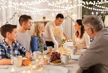 Image showing happy family having birthday party at home