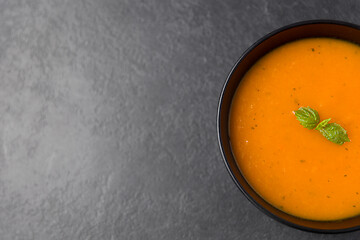 Image showing close up of vegetable pumpkin cream soup in bowl