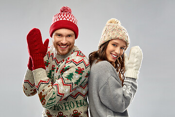 Image showing happy couple at christmas ugly sweater party