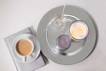 Image showing coffee, candles and aroma reed diffuser on table