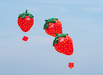 Image showing Strawberry kites flying
