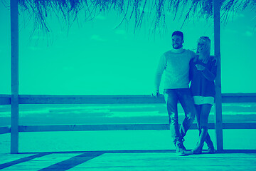 Image showing Couple chating and having fun at beach bar