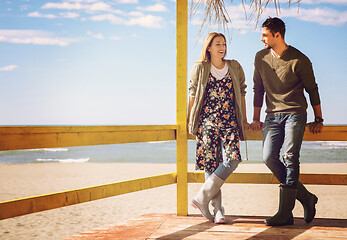 Image showing Couple chating and having fun at beach bar