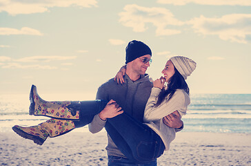 Image showing Couple chating and having fun at beach bar