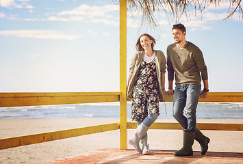 Image showing Couple chating and having fun at beach bar