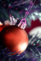 Image showing Christmas ornaments on tree.