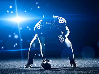 Image showing American football player starting football game