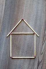 Image showing simple house of match sticks