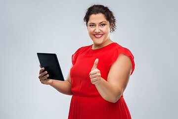 Image showing happy woman with tablet computer showing thumbs up