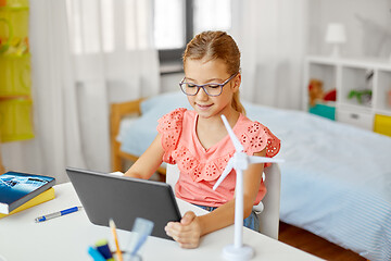 Image showing student girl with tablet pc and wind turbine model