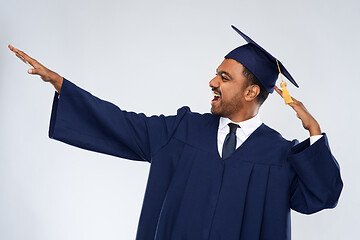 Image showing happy indian graduate student celebrating success