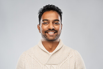 Image showing indian man in knitted sweater over gray background