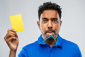 Image showing indian referee whistling and showing yellow card