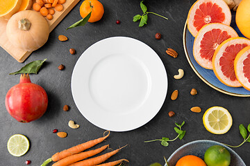 Image showing plate, vegetables and fruits on on slate table