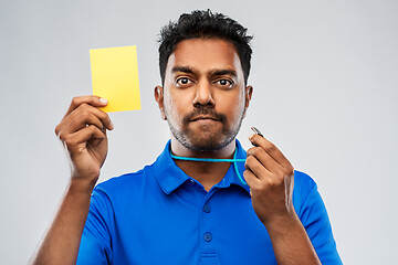 Image showing indian referee whistling and showing yellow card