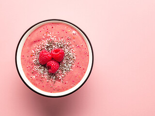 Image showing breakfast smoothie bowl on pink background