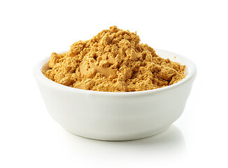 Image showing bowl of dried rose hip fruit powder