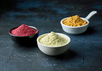 Image showing three bowls of dried plant powder