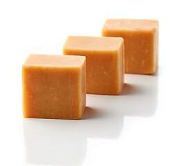 Image showing caramel candies on a white background