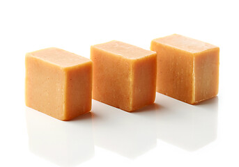 Image showing caramel candies on a white background