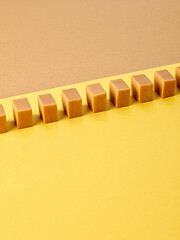 Image showing line of caramel candies