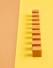 Image showing line of caramel candies