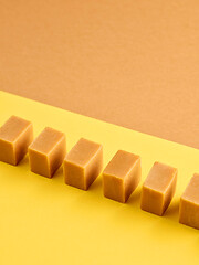 Image showing line of caramel candies