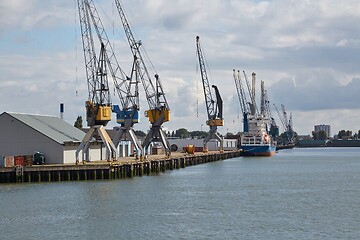 Image showing Industrial ships in dock with rotterdam city view