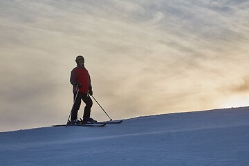 Image showing Skier against glowing sky