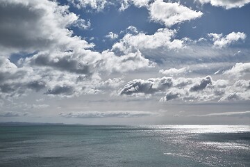 Image showing Endless sea view, bright sunlight and clouds